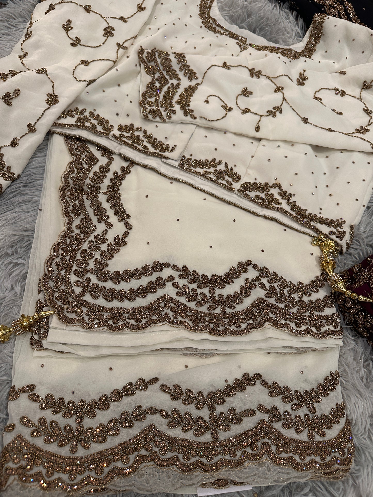 Stylish Gold stone work Saree with ready made blouse.